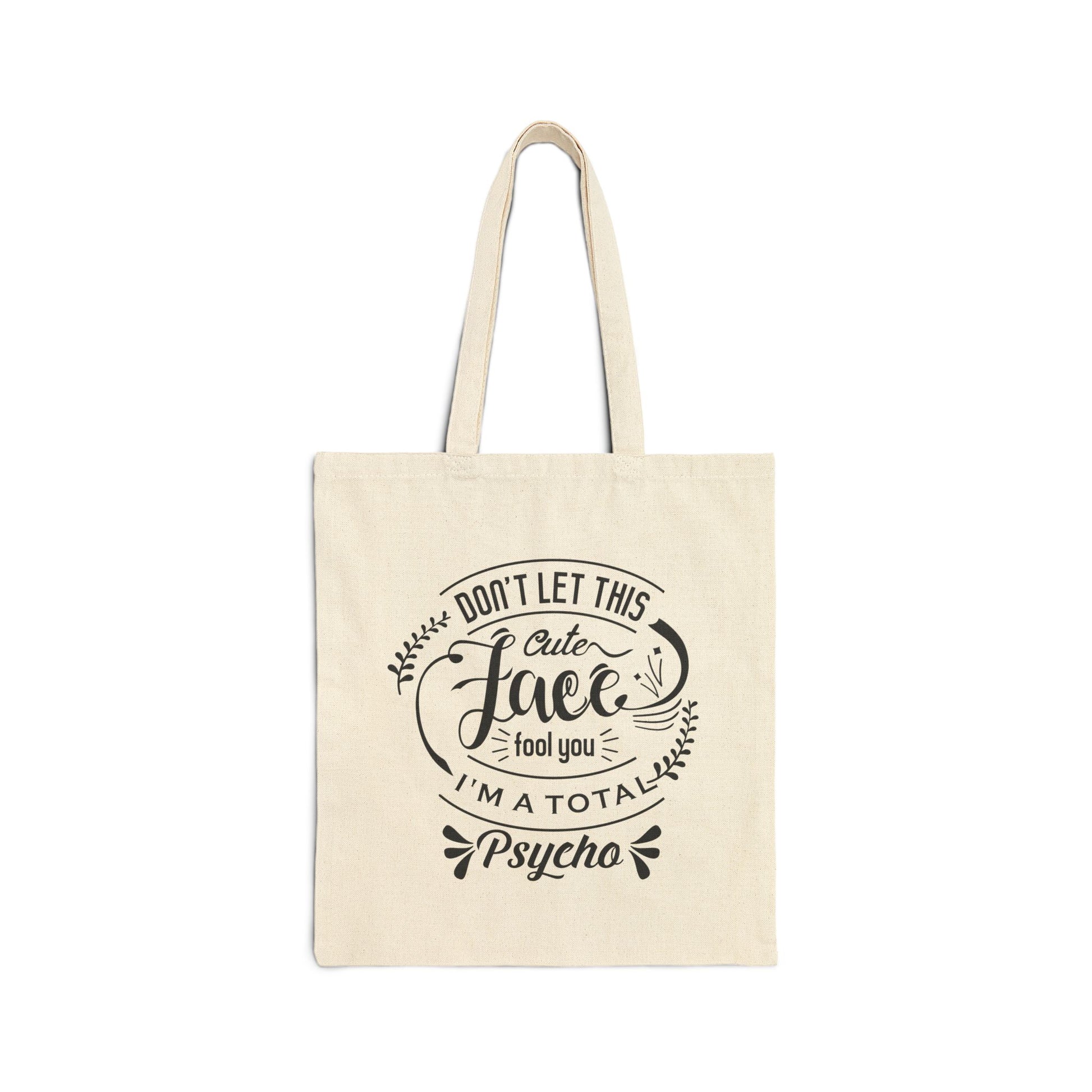 Beige tote bag with black text design on a white background