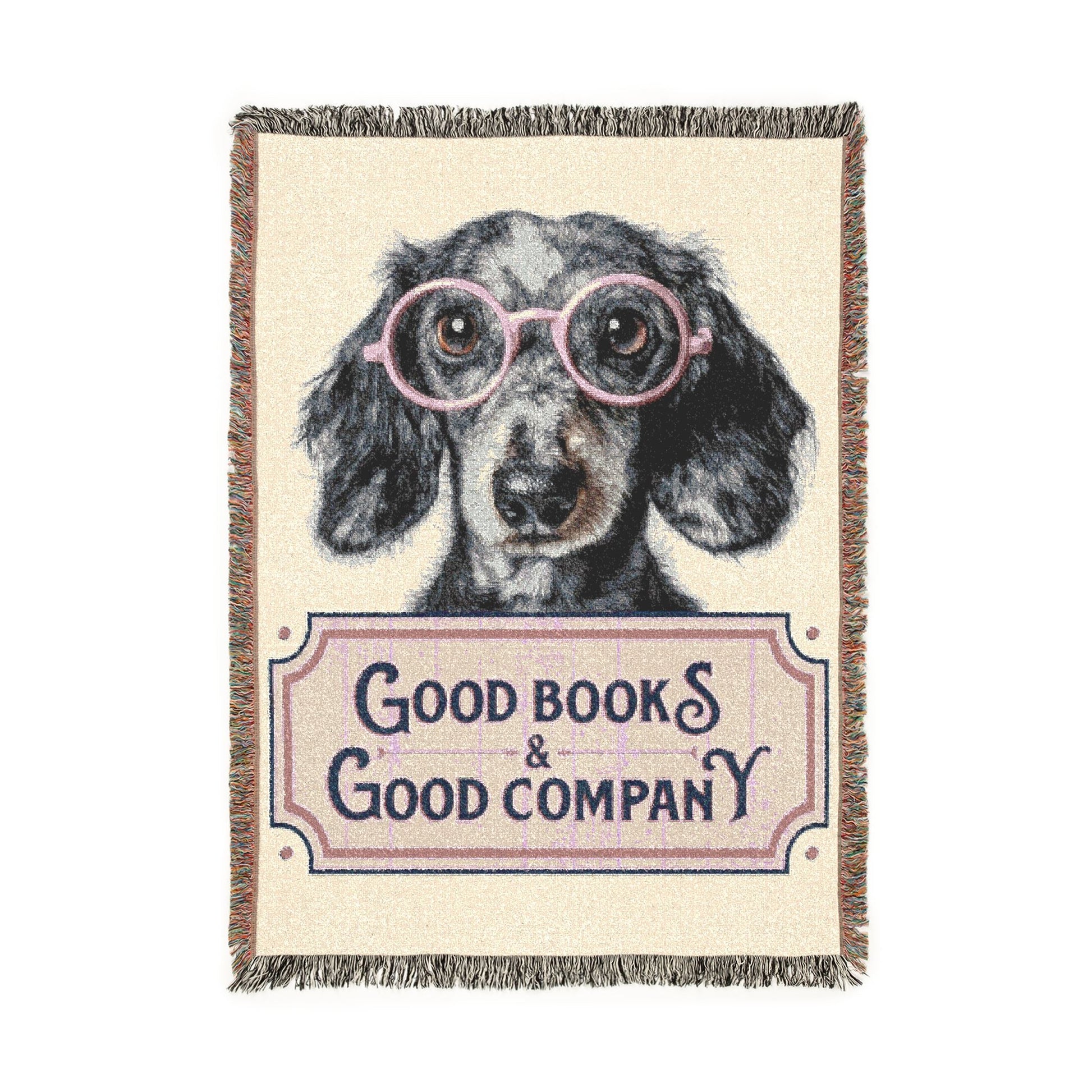 Woven blanket with a dog wearing glasses and 'Good Books & Good Company' text on a white background