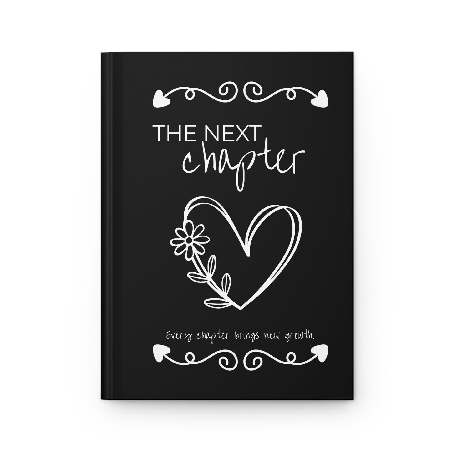 Black notebook with white text and design on a white background