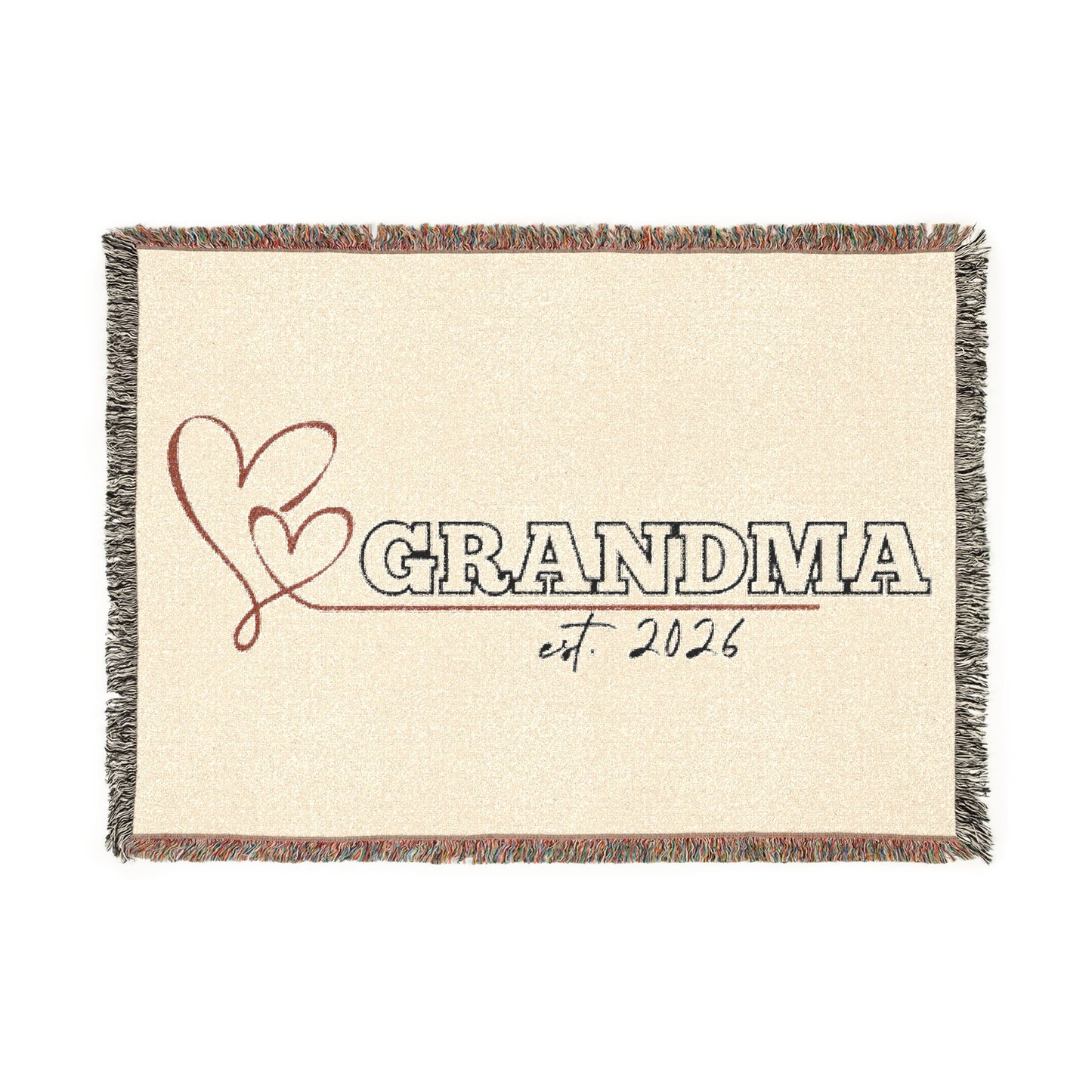 Blanket with 'GRANDMA est. 2026' text and heart design on a white background