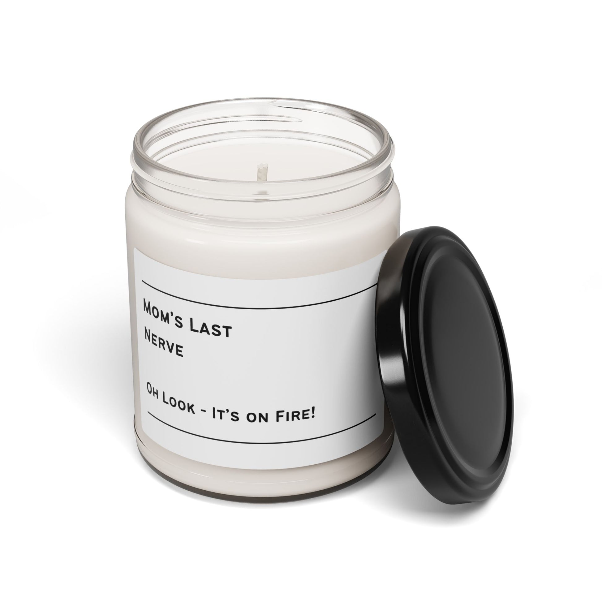 Candle jar labeled 'Mom's Last Nerve' with a black lid on a white background